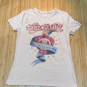 Aerosmith graphic tee shirt. Gold metallic accents. Size XS. NWOT.